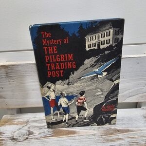 Vintage hardcover book "The Mystery of the Pilgrim Trading Post"